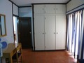 roupeiro e varanda no quarto